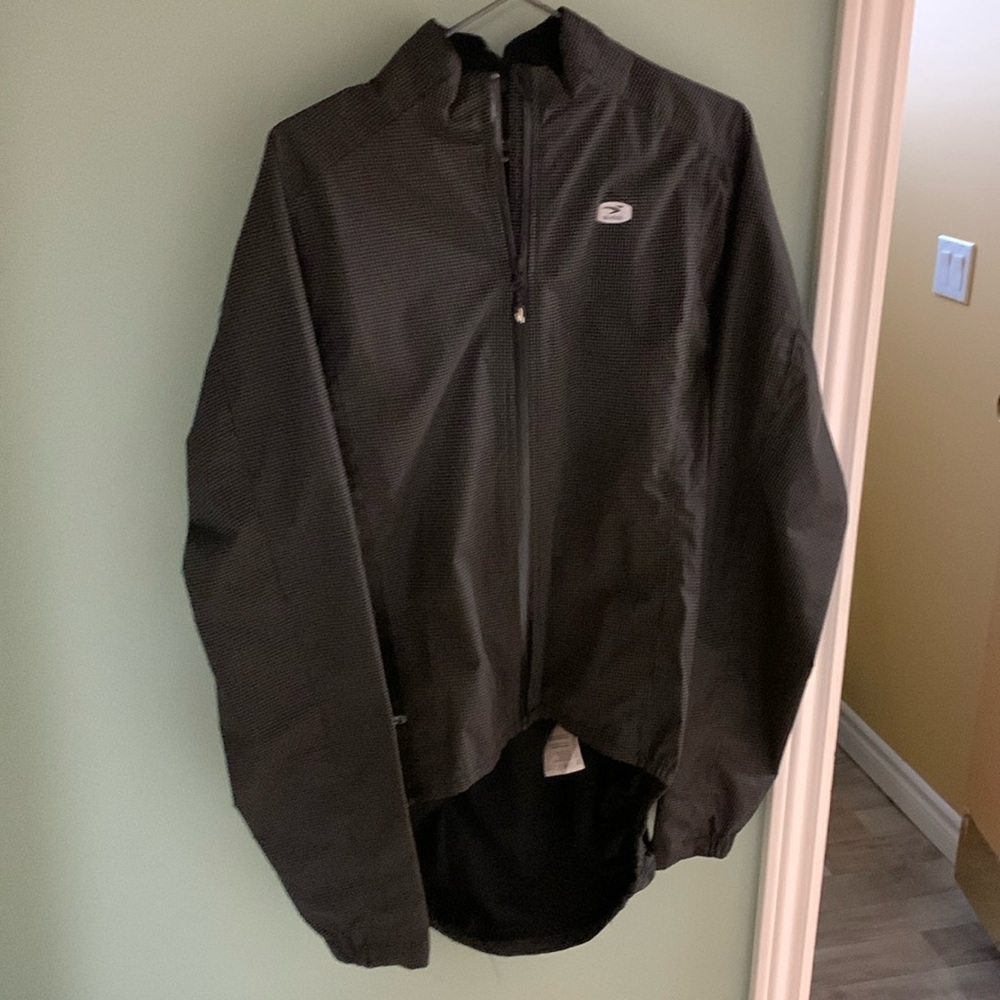 Brand new never worn waterproof bike jacket